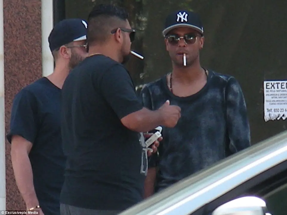 ashley_cole_right_was_pictured_smoking_a_cigarette